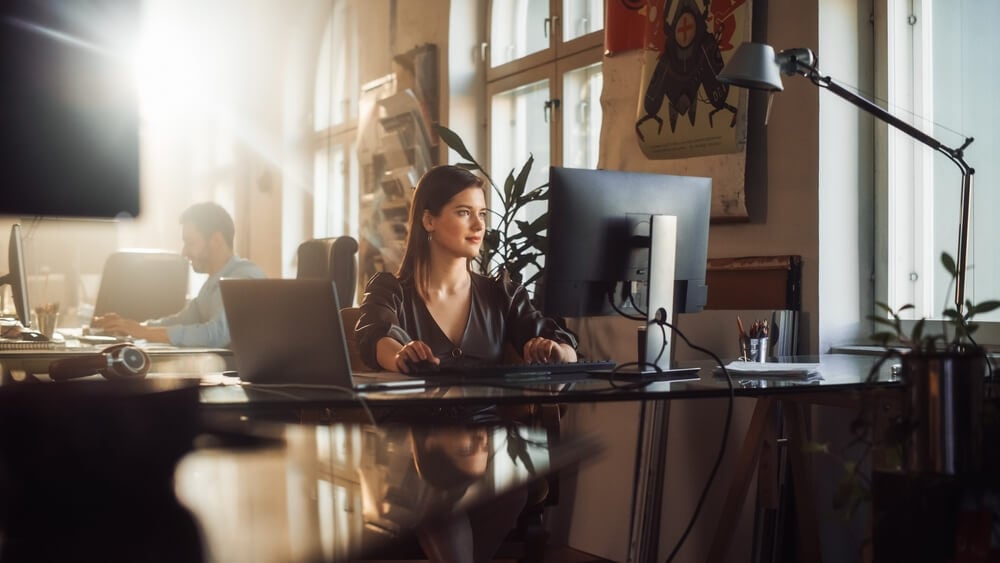 Marketing employee at company checking digital ads