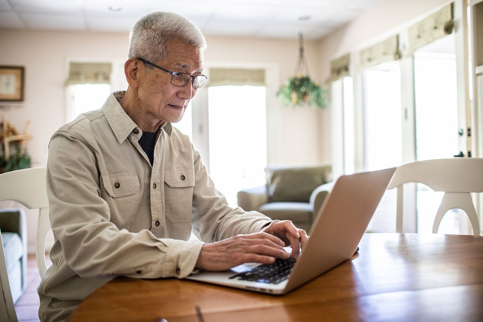 senior-man-laptop-GettyImages-1311072991